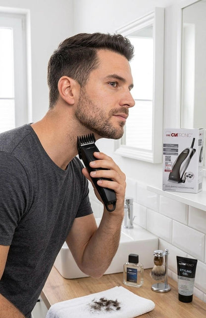 Masina de tuns profesionala Clatronic, pentru par și barba, lame din oțel inoxidabil, 4 piepteni accesorii, negru/argintiu